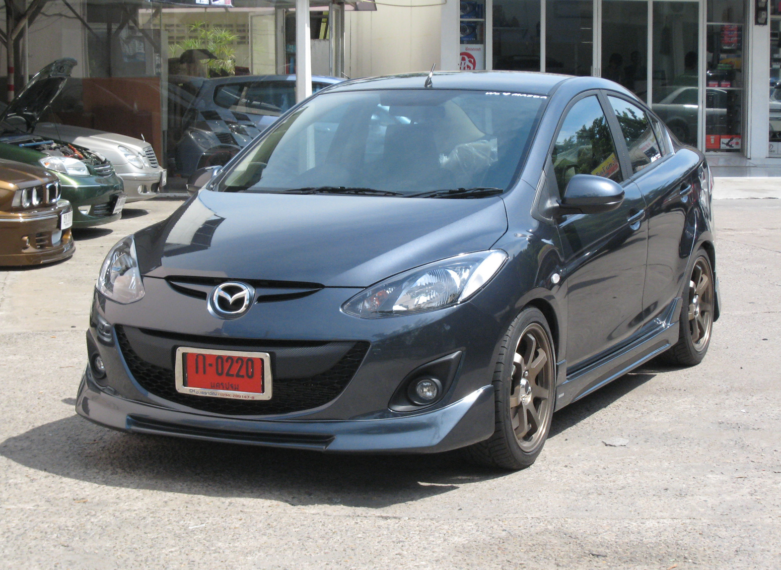 ชุดแต่ง Mazda2 2009-2013 NTS1 V1